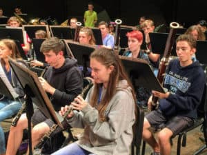 students onstage in band